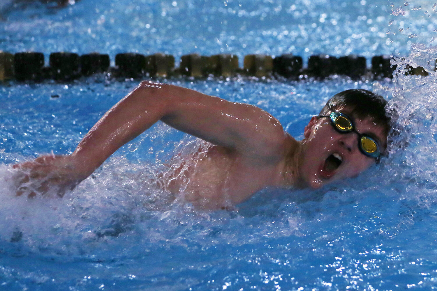 Mason Morrison takes a breath during the first half of his 200-yard freestyle